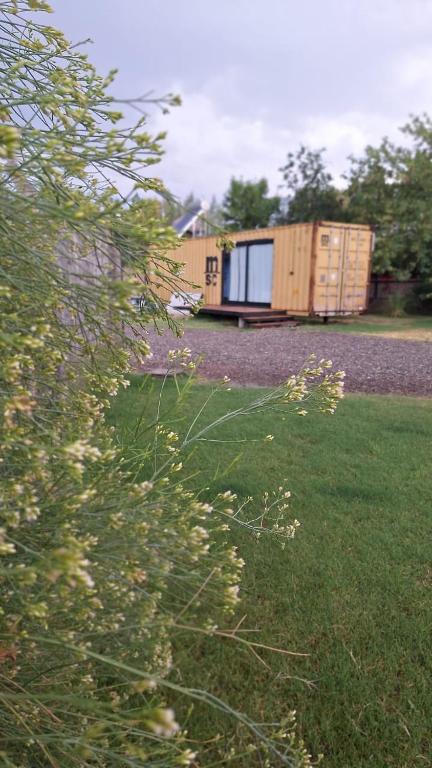 Cubil Amarillo. Casa conteiner 1 dormitorio